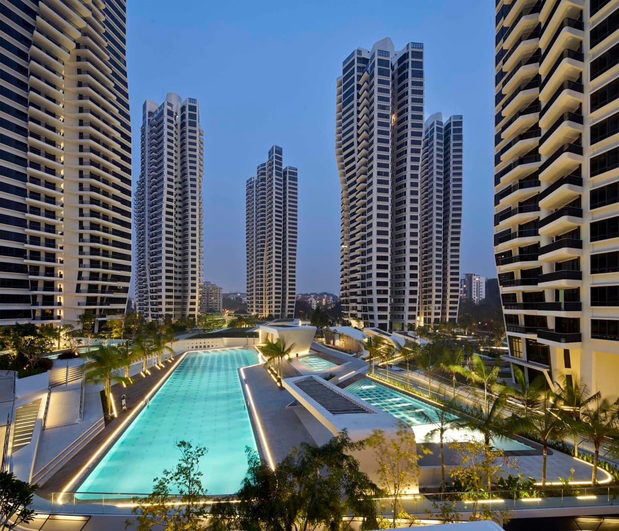 D'Leedon pool and towers at dusk